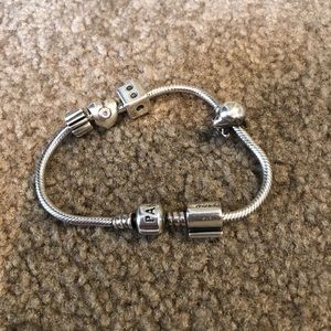 Pandora bracelet with 5 charms and necklace.